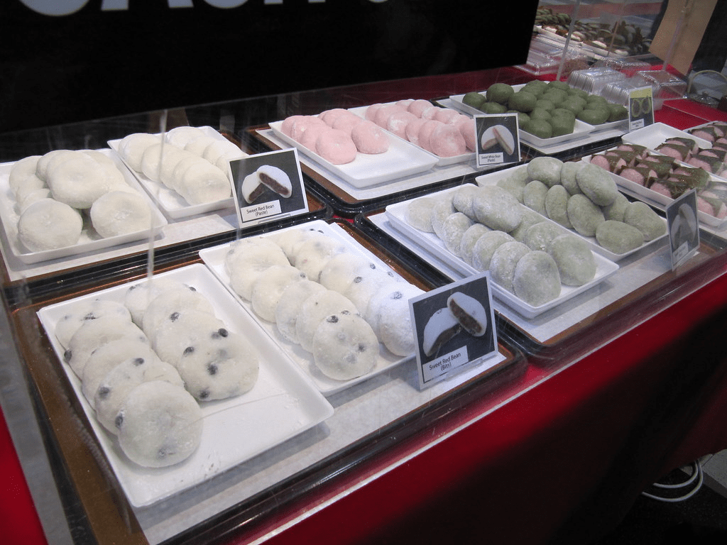 counter with display of different flavors of mochi ice cream