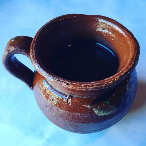 Cafe de Olla in a traditional earthenware pot 